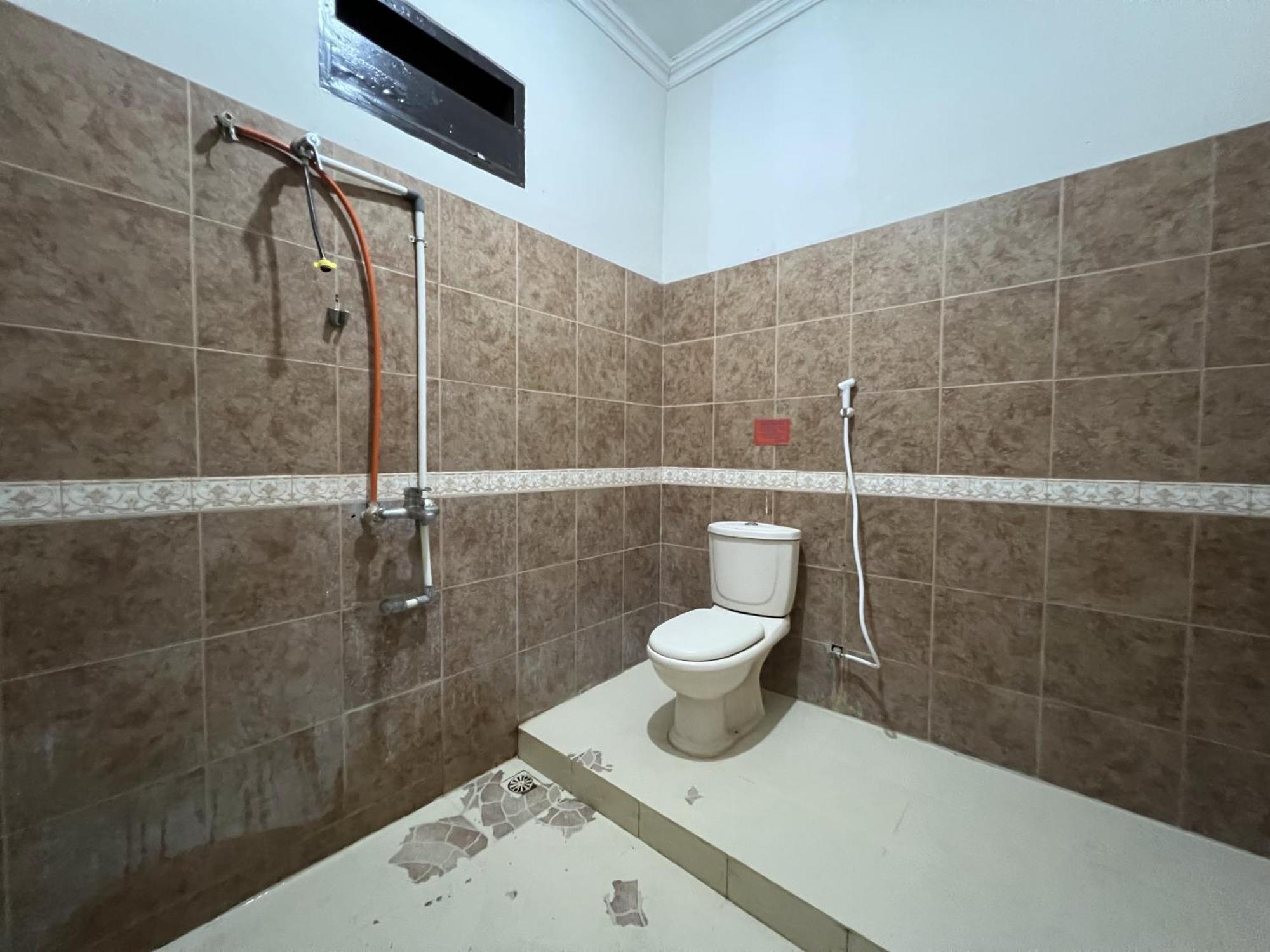 Oyo 92098 Kost Orange Syariah Hotel Makassar Eksteriør billede
